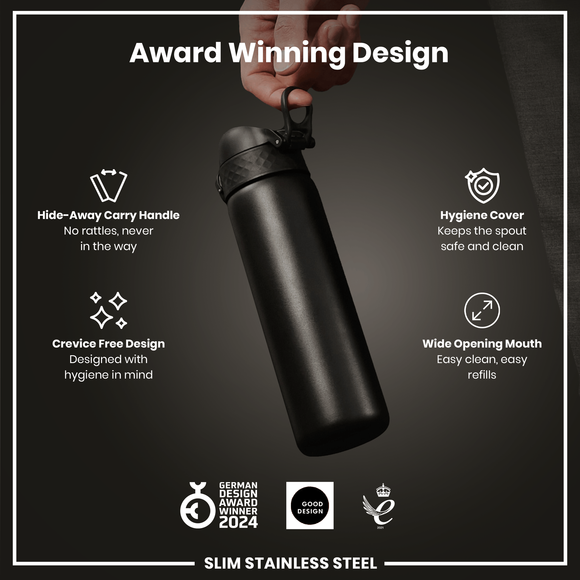 A hand holds a black, slim stainless steel water bottle. Its features include a hide-away handle, hygiene cover, and wide mouth. The bottle is an award-winning design.