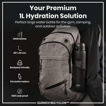 A gray backpack holds a black water bottle; it's designed for gym, camping, and outdoor use. The bottle is 1000ml/34oz and backpack-friendly, fitting bottle holders; it's 100% leak-proof. QUENCH RECYCLON™ is the brand.