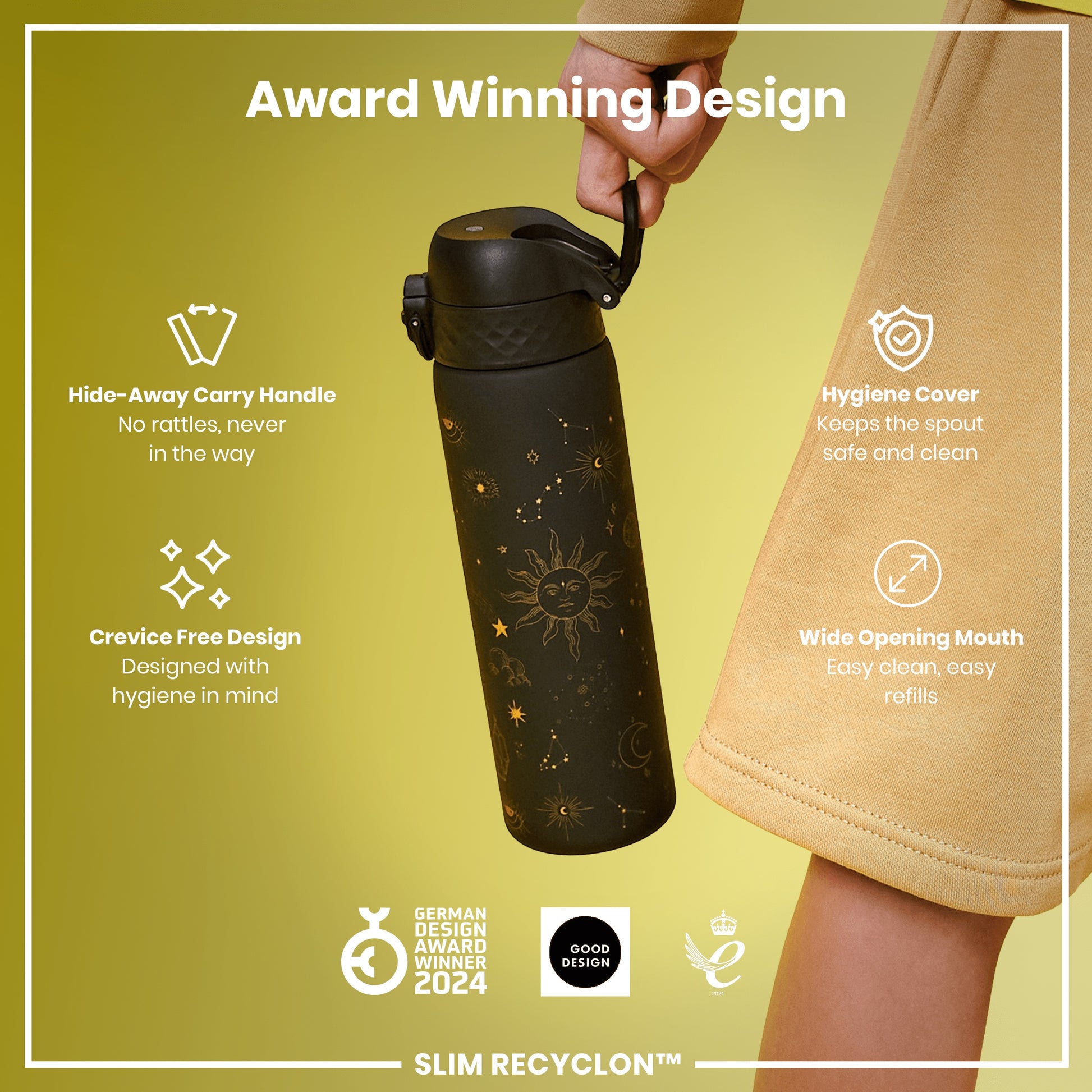 A person holds a black, astrologically-designed water bottle with a built-in handle. The bottle features several design elements prioritizing hygiene and ease of use; it's an award-winning design.