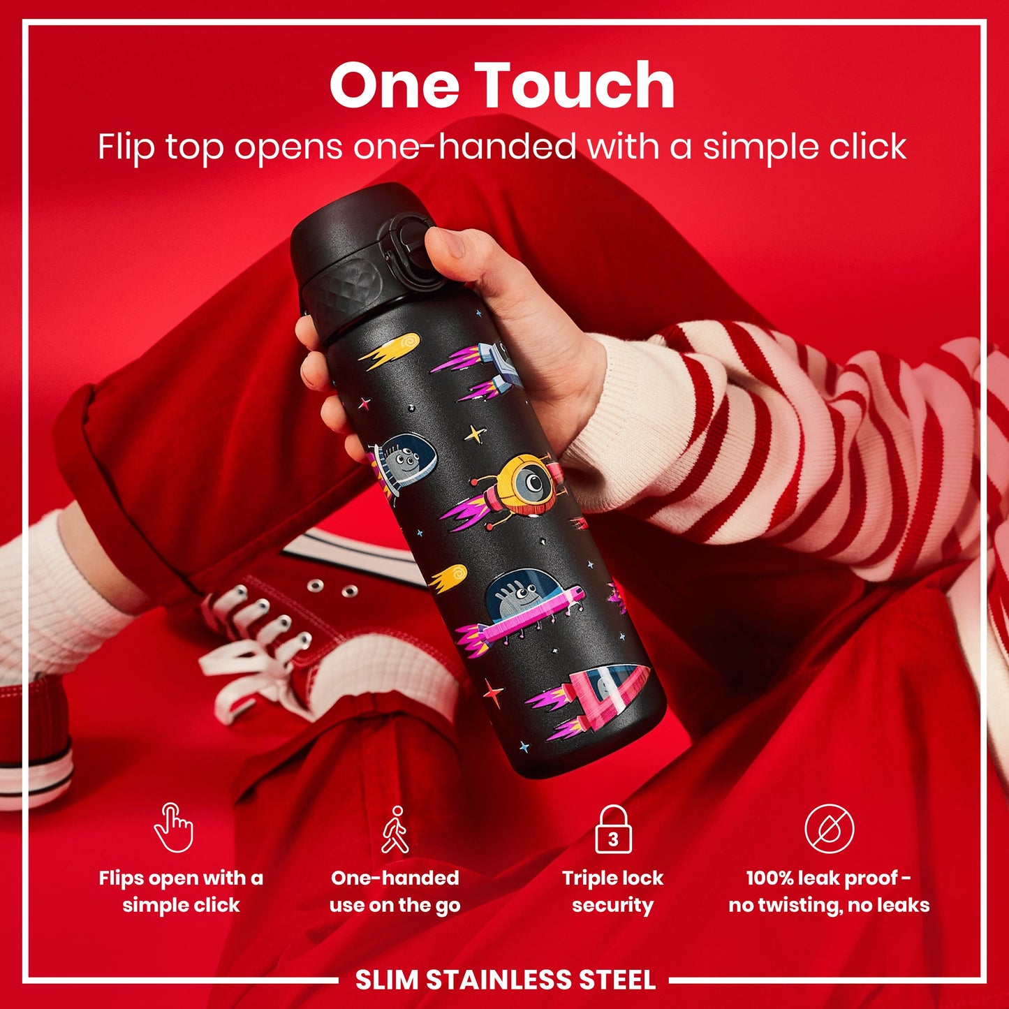 A black, space-themed water bottle is held; its flip top opens one-handed. The bottle is situated on a red background. "One Touch. Flip top opens one-handed with a simple click. Flips open with a simple click. One-handed use on the go. Triple lock security. 100% leak proof - no twisting, no leaks. SLIM STAINLESS STEEL"