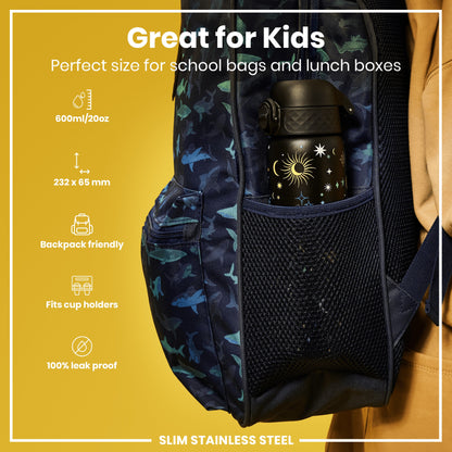 A water bottle fits into a backpack’s mesh pocket; it’s 600ml/20oz, 232 x 65 mm, backpack-friendly, fits cup holders, and is leak-proof. The backpack is dark-colored with a shark pattern. The bottle features celestial designs.