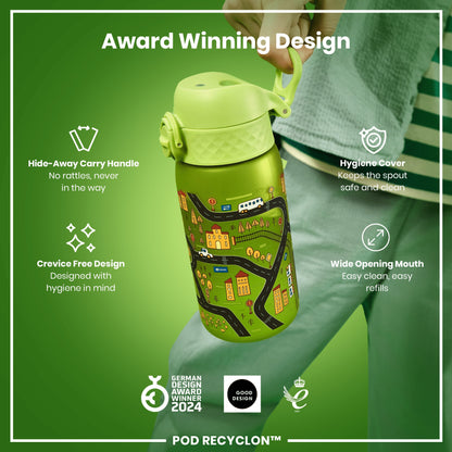 A lime green water bottle, with a cartoon town design, is being held. Its features include a hide-away handle, hygiene cover, and wide mouth. It's an award-winning design. GERMAN DESIGN AWARD WINNER 2024; GOOD DESIGN; 2021. POD RECYCLON™.