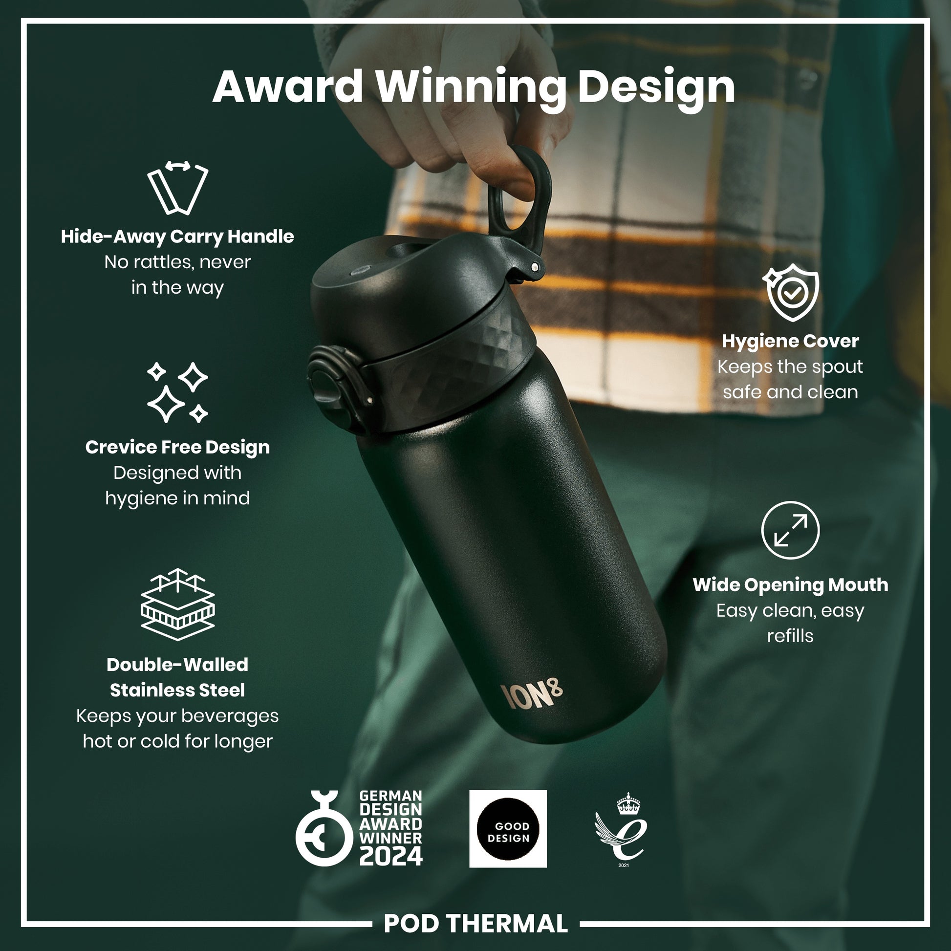 A dark-green thermal bottle is being held; it features a hide-away handle, wide mouth, and hygienic design. The bottle is an award winner.