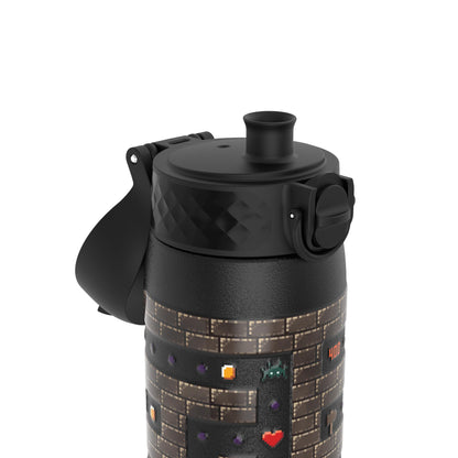 A black water bottle with a textured lid and handle features pixelated game graphics, including hearts and an alien, against a brick-patterned background in a digital style.