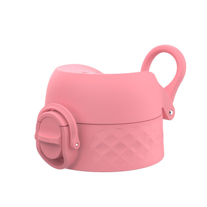 Pink bottle lid with a silicone spout cap and a diamond-patterned grip sits against a plain white background featuring a carrying loop on the side.