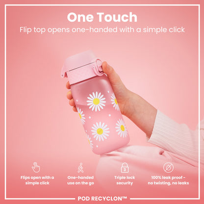 A pink daisy-patterned water bottle is held; its flip top opens one-handed via a simple click; against a pink background.