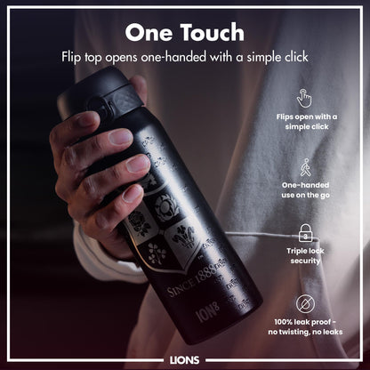 A dark-colored water bottle with a flip top is held; its lid opens with a single click. The bottle features engravings and is held by a person wearing a light-colored sweatshirt. "One Touch," "Flips open with a simple click," "One-handed use on the go," "Triple lock security," "100% leak proof - no twisting, no leaks," and "SINCE 1888" are visible.