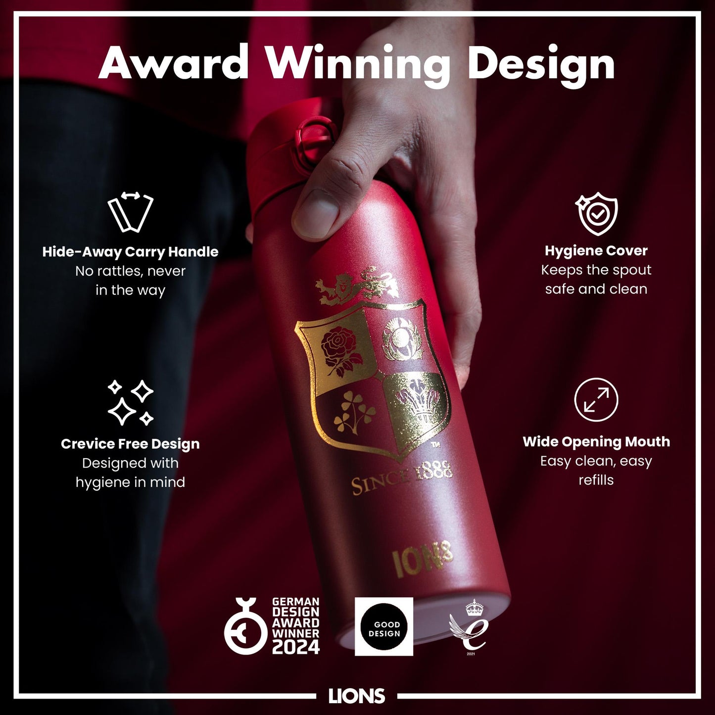 A red, cylindrical water bottle is held in a hand. It features a hide-away handle, a hygiene cover, and a wide mouth. The bottle displays several awards and the text "SINCE 1888" and "LIONS".